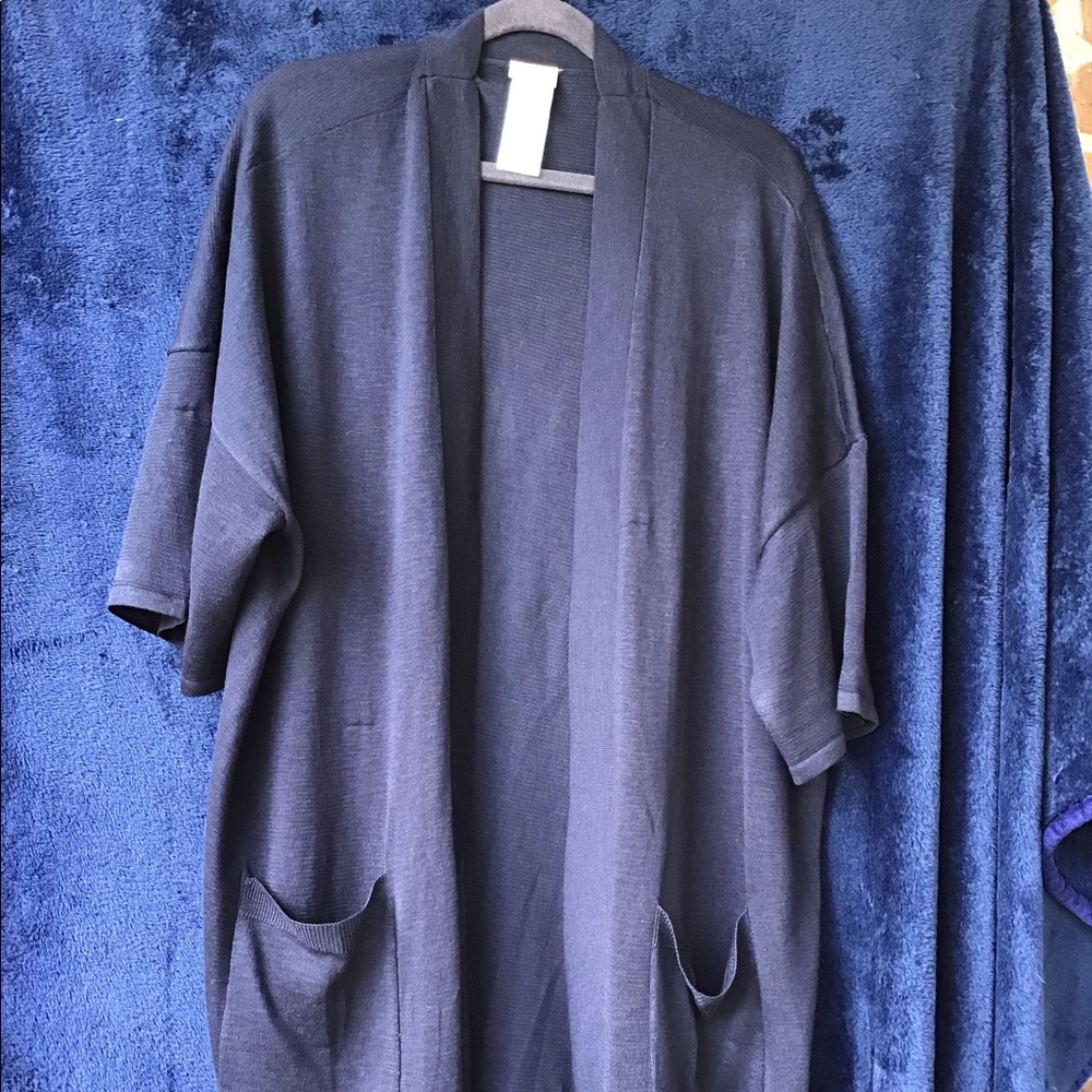 Chico’s navy cardigan. Short sleeve size 2